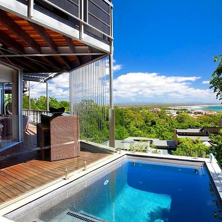 เปปเปอร์ นูซา รีสอร์ตแอนด์วิลลา Hotel นูซาเฮดส์ ภายนอก รูปภาพ A pool at a private residence in Queensland, Australia