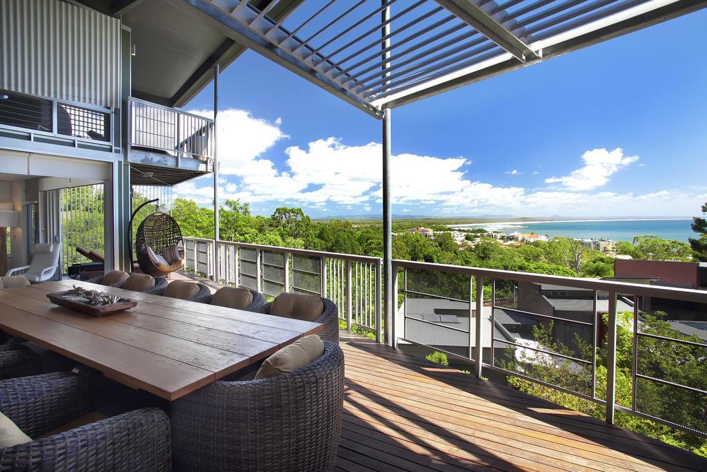 เปปเปอร์ นูซา รีสอร์ตแอนด์วิลลา Hotel นูซาเฮดส์ ภายนอก รูปภาพ A view from a balcony